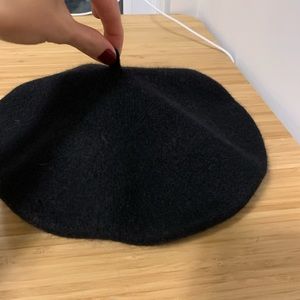 Black wool like beret. New